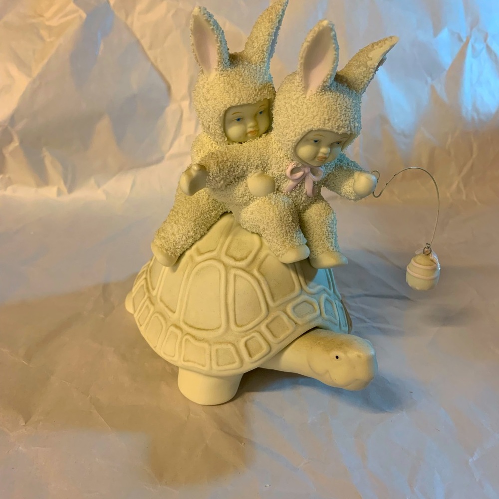 Two snow babies riding a turtle. Year 1995.